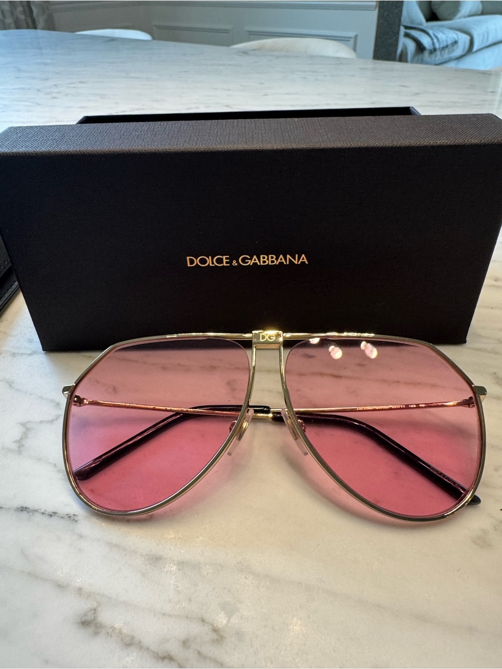 Dolce & Gabbana Gold Frame Sunglasses with Pink Lenses